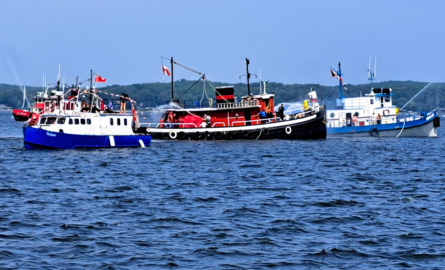 Tugboats lined up at pier