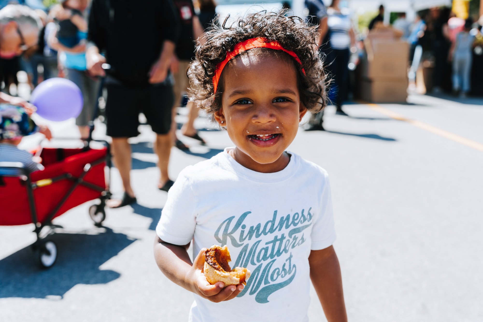 Girl holding a butter tart