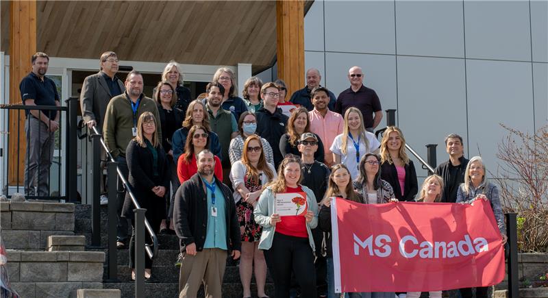 MS Canada Flag Raising People standing with Flag