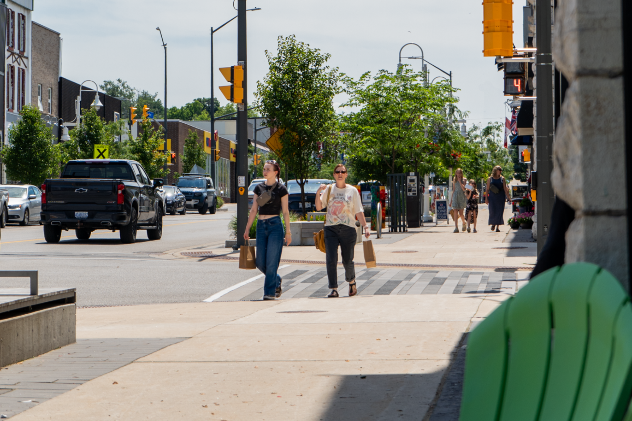 people sitting on rocks facing same way