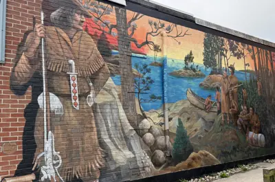 Runners in the Wood mural after restoration