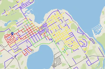 A colour‑coded street map of Midland with roads highlighted in gree, yellow, red, purple, or gray.