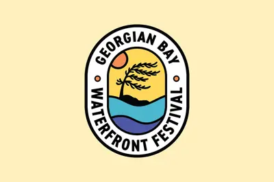 A logo for the Georgian Bay Waterfront Festival featuring a stylized waterfront scene with blue waves, a windswept tree, and a setting sun inside an oval emblem. The text “Georgian Bay Waterfront Festival” surrounds the illustration on a light beige background.